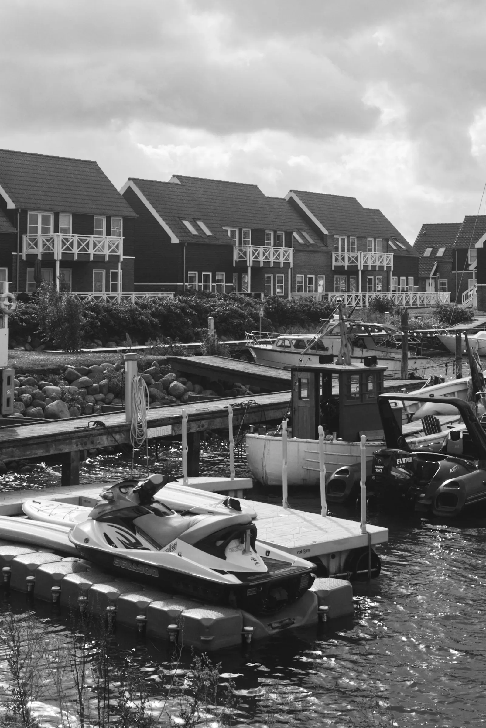 A personal watercraft tied up at a marina dock